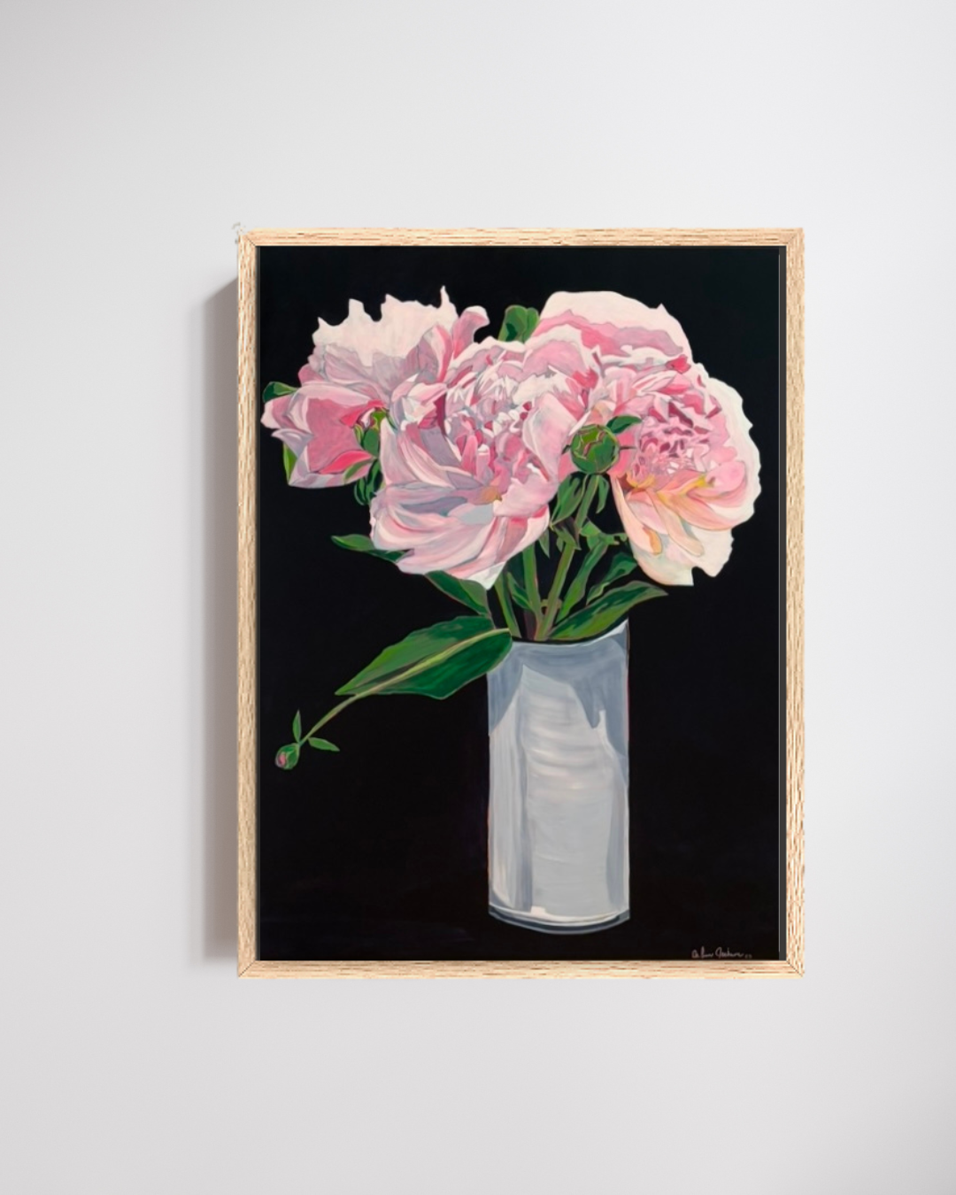 Framed artwork of pink flowers in a vase on a light gray background